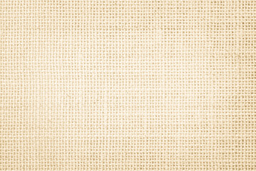 Jute hessian sackcloth burlap canvas woven, linen and cotton texture background pattern in light beige cream brown natural

