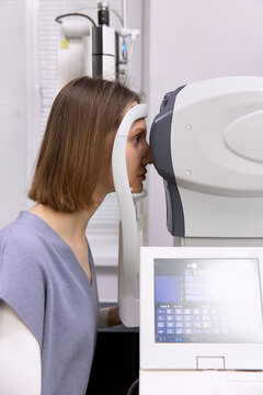Young patient doing vision diagnostics test in clinic
