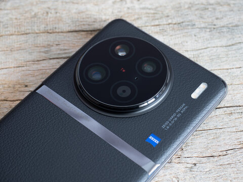 Galati, Romania - March 10, 2023: Recently launched vivo X90 Pro smartphone with triple 1 inch cameraa on the back with laser focus. Vivo brand on the back