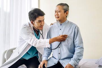 Asian man doctor service help support discussing and consulting talk to asian sick senior man patient at meeting health medical care trust concept in hospital.healthcare and medicine