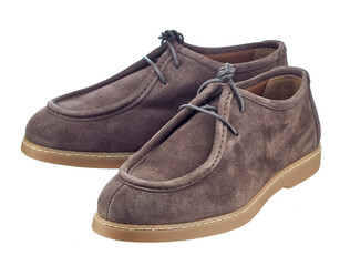 Beautiful pair of light, elegant beige suede shoes, isolated on a white background. Trends of the season: comfortable shoes made of natural materials.