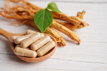 Ginseng roots and green leaf, healthy food.