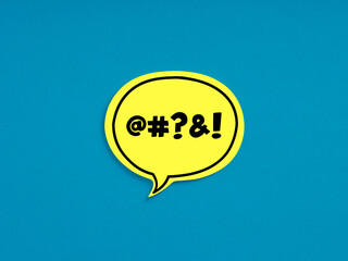 Swear words or cursing on yellow speech bubble on blue background.