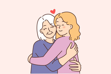 Elderly grandmother hug happy grownup daughter 