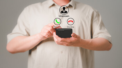 Man answering to incoming call. Phone call from unknown number. Call center gang, scammer or stranger. Hoax person with fake identity. Scam, fraud or phishing with mobile phone or smartphone concept.