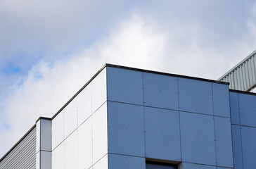 Fototapeta na wymiar Tall modern factory wall example