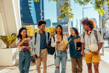 College students walking in street.