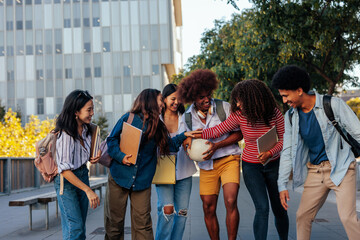 Fototapeta premium Playful students have fun outside.