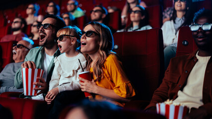 Family watching 3D movie.