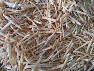 close up of taro chips that have been fried but not yet seasoned