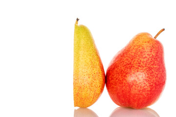 One half and one whole pear, close-up, on a white background.