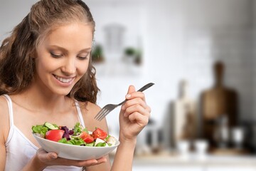 Funny young Woman Eating tasty salad