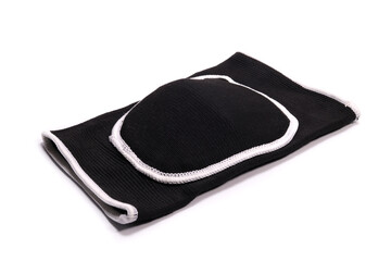 Volleyball or gymnastics elastic protective knee pad isolated on a white