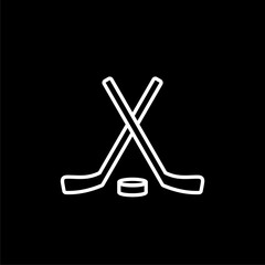 Hockey sticks and puck icon isolated on black background. 