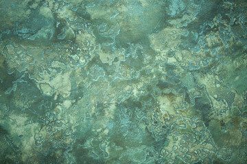 Green background from decorative plaster with abstract spots. Unusual green wall texture with beautiful patterns, creative surface background. Front covering for facing of buildings.