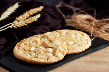 Freshly homemade chocolate cookies on a chalkboard
