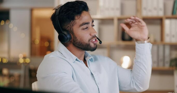 Call center, man and consulting on computer of office consultant, sales and advice at night. Male telemarketing agent talking online at desktop for crm communication, support and questions in evening