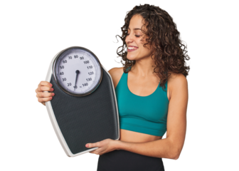 Success on the scale! This dedicated athlete celebrates her hard work, sacrifice, and progress towards her goals.