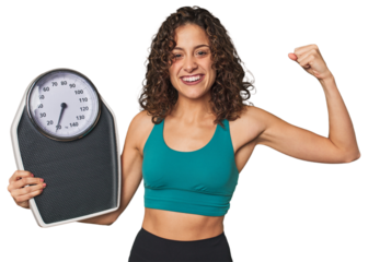 Success on the scale! This dedicated athlete celebrates her hard work, sacrifice, and progress towards her goals.