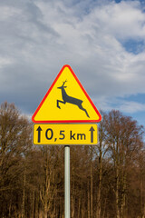 Warning sign on a road