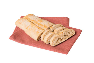 Assortment of freshly sliced baked bread with napkin isolated on white background. Healthy unleavened bread. French bread slice