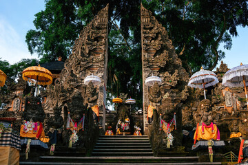 The stairway to the Indonesian temple Pura Dalem in Ubud in the evening.