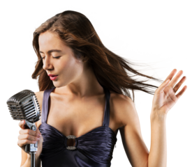 Young woman singing into microphone