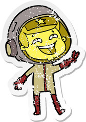 distressed sticker of a cartoon laughing astronaut