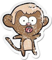 distressed sticker of a cartoon shocked monkey