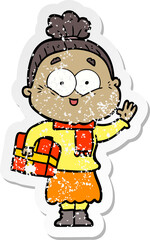 distressed sticker of a cartoon happy old woman