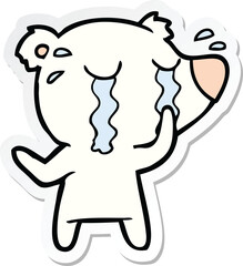 sticker of a cartoon crying polar bear