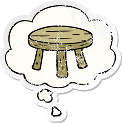 cartoon small stool and thought bubble as a distressed worn sticker