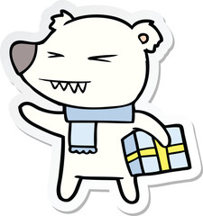 sticker of a cartoon angry polar bear with xmas present