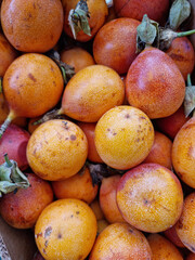 Edible passion flower, edible passionflower, granadilla, passion fruit is an evergreen tropical liana. High quality photo