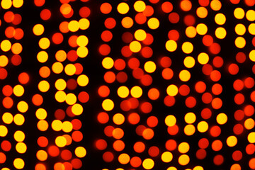 Beautiful red and yellow night bokeh light, abstract blur defocused background. Colorful overlay...