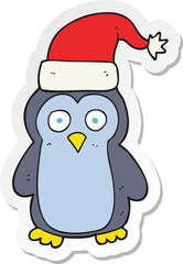 sticker of a cartoon christmas penguin