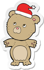 sticker of a cartoon bear in christmas hat