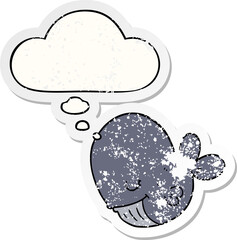 cartoon whale and thought bubble as a distressed worn sticker