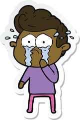 sticker of a cartoon crying man