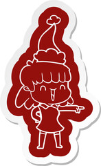 cartoon  sticker of a happy girl wearing santa hat