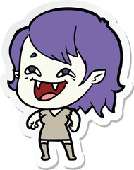 sticker of a cartoon laughing vampire girl