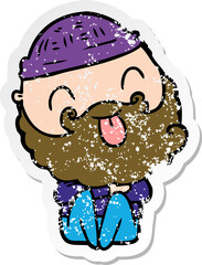 distressed sticker of a man with beard sticking out tongue
