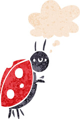 cartoon ladybug and thought bubble in retro textured style