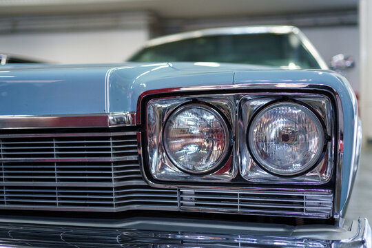 A Close Up Look At A Classic Car. Retro Automobile Exterior Scene. Front Detail View Of Old Vehicle.