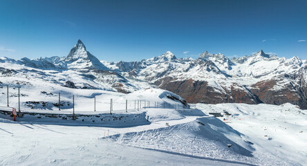 Beautiful Zermatt ski resort with view of the Matterhorn peak on the horizon. Beautiful Swiss Alps.