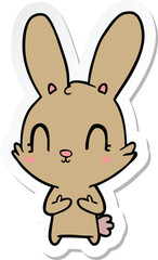 Obraz na płótnie Canvas sticker of a cute cartoon rabbit