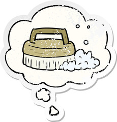 cartoon scrubbing brush and thought bubble as a distressed worn sticker