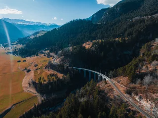 Keuken foto achterwand Landwasserviaduct Aerial view famous mountain in Filisur, Switzerland. Landwasser Viaduct - world heritage with train Glacier express in Swiss Alps.