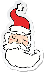 sticker of a cartoon santa face