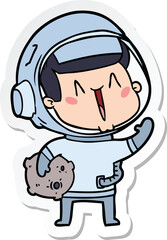 sticker of a happy cartoon astronaut with moon rock